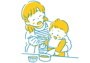 食事を与える母親